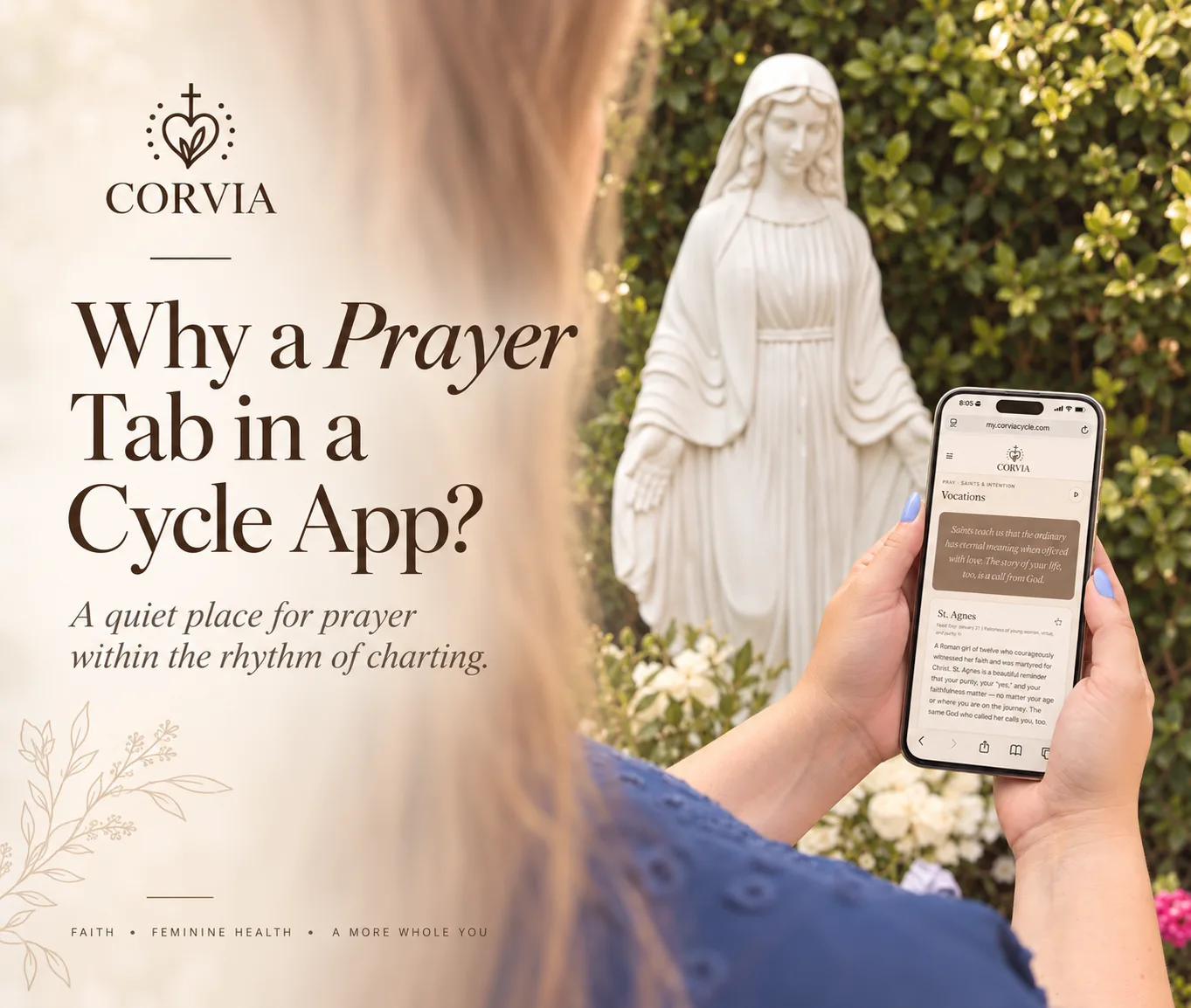 A woman holding her phone showing the Corvia prayer library, in front of a white Marian statue among flowering shrubs