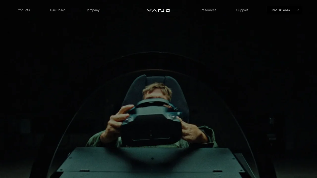 Varjo website homepage showing a person wearing a Varjo headset in a simulation training setting.