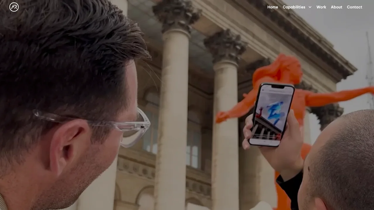 Aircards Studio website, showing an augmented reality brand experience being viewed through a phone.