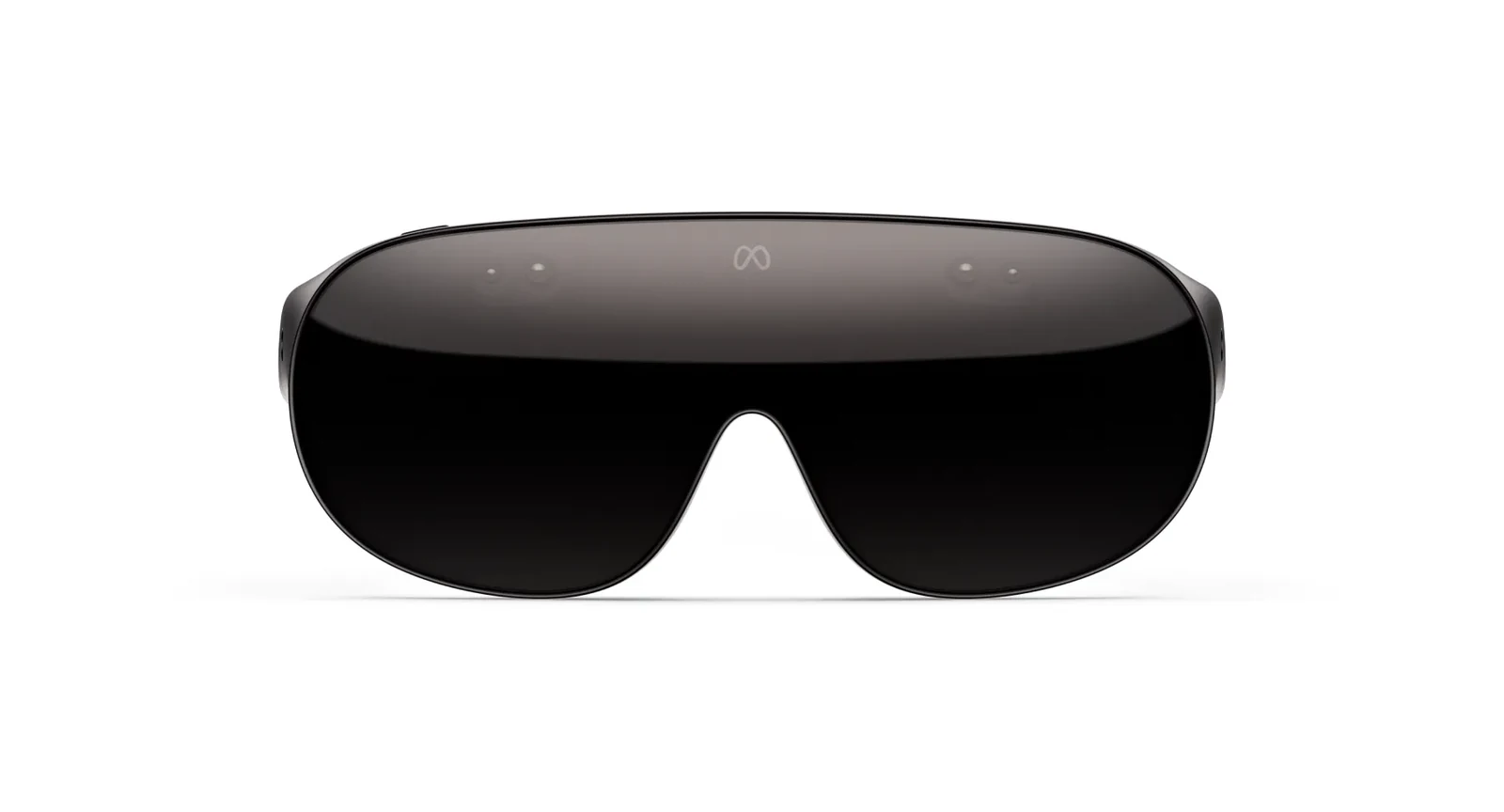 Front view of Meta VR Glasses on a white background, a single dark wraparound visor with a small Meta logo at the center of the brow and two pairs of sensor openings set into the lens above each eye