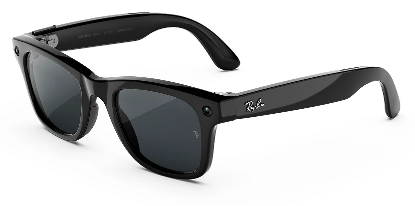 Ray-Ban Meta Gen 3 Wayfarer glasses at three quarters on white, a shiny black frame with dark lenses, a camera in one outer corner and a capture LED in the other