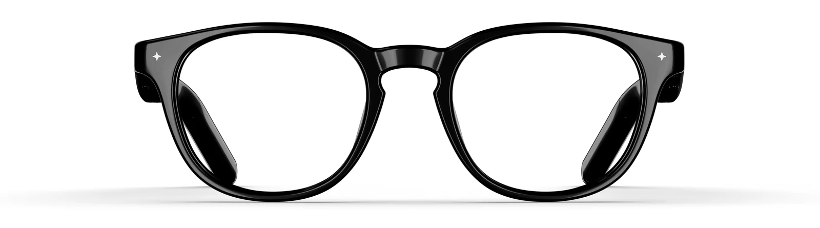 VONDER Basel frame shown head-on on a white background, a black round acetate frame with clear lenses and a small metal accent at each upper corner