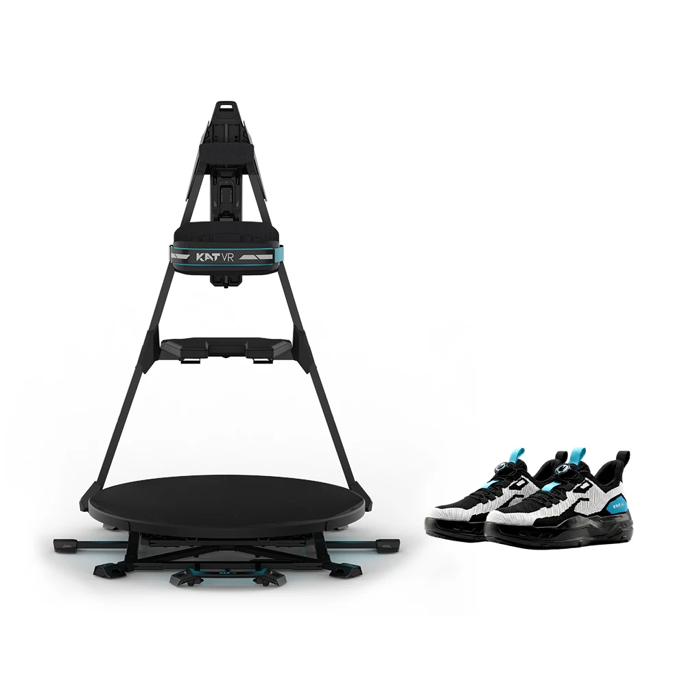 KAT Walk C3 Ultra VR treadmill in black on a white background, a round low platform on a cross-shaped stabilizing base with an A-frame support rising to a waist ring marked KAT VR, shown beside a pair of black, white and blue C3 shoes