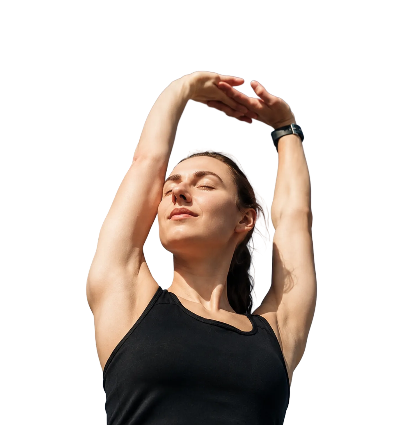 Woman in black tank top stretching arms above head with eyes closed, enjoying sunlight.