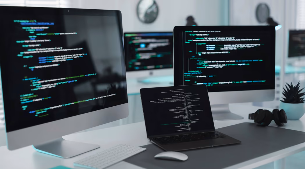 Three computer screens