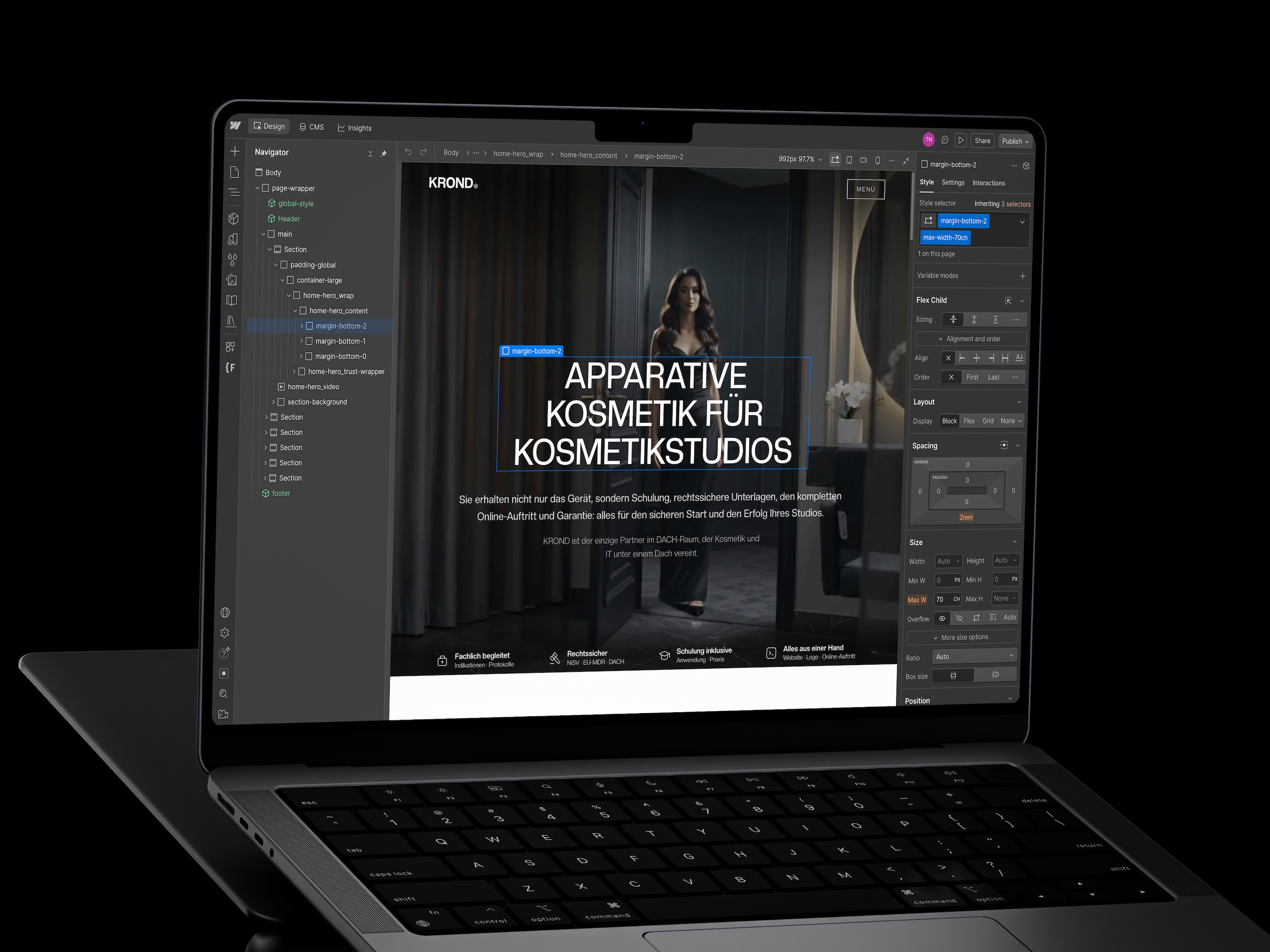 Webflow Designer auf einem Laptop: die KROND-Startseite „Apparative Kosmetik für Kosmetikstudios“ in Bearbeitung, links der Navigator mit der Seitenstruktur