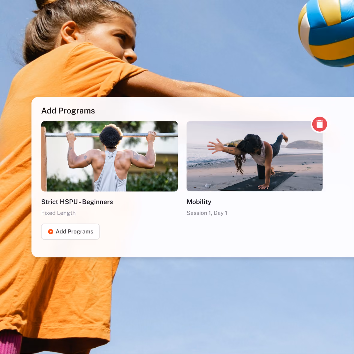 User interface overlay on a photo of a person in an orange shirt stretching outdoors under a blue sky, holding a volleyball. The interface titled 'Add Programs' shows two program cards: one with a man doing pull-ups labeled 'Strict HSPU - Beginners' with 'Fixed Length,' and another with a woman practicing yoga on a beach labeled 'Mobility' with 'Session 1, Day 1.' A button labeled '+ Add Programs' is visible, along with a red trash icon.