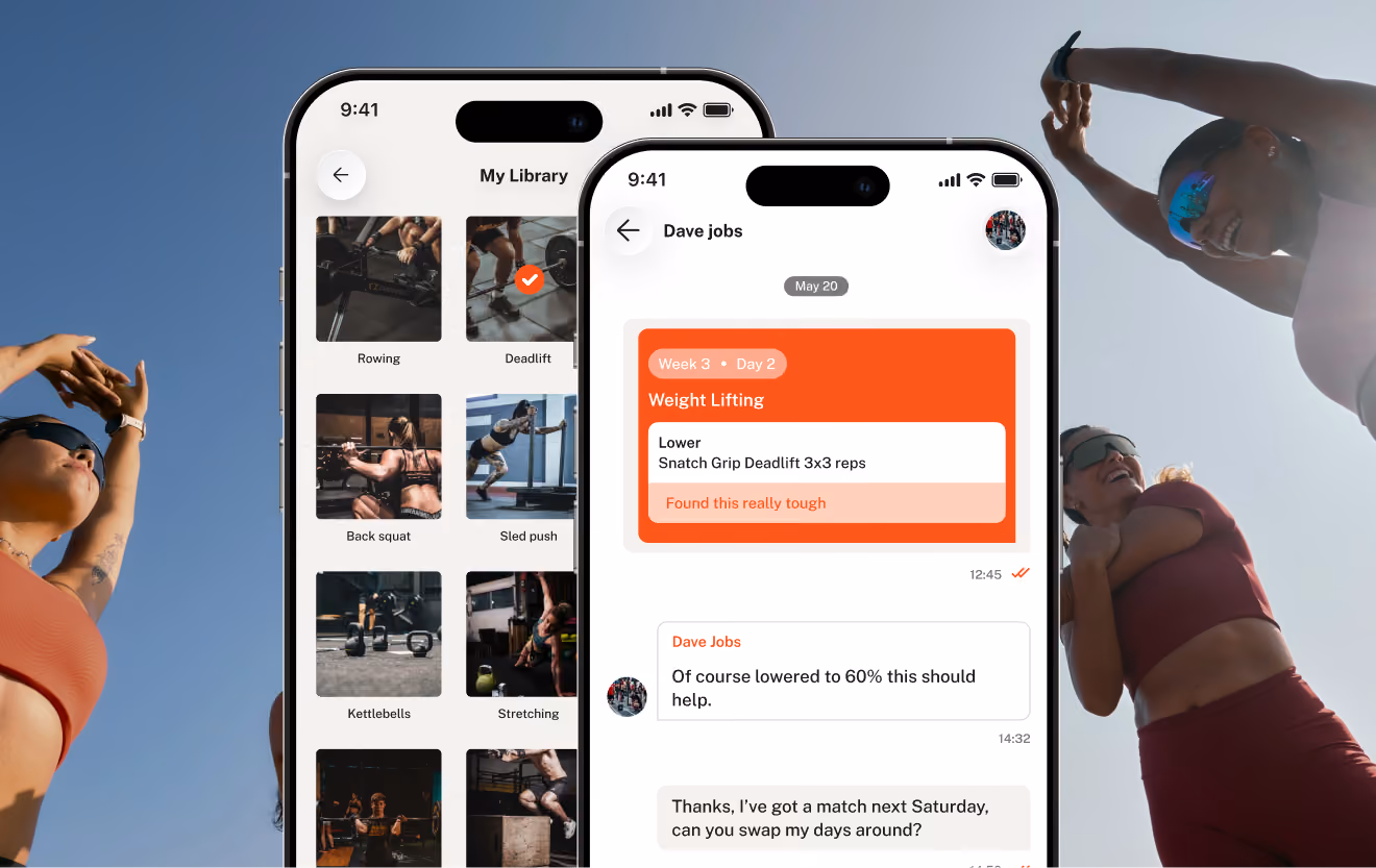 Two smartphones displaying a fitness coaching app interface with workout selections like rowing, deadlift, back squat, and kettlebells on one screen and a chat conversation on another discussing weight lifting exercises and schedule changes, with two athletic women stretching in the background outdoors under a clear blue sky.
