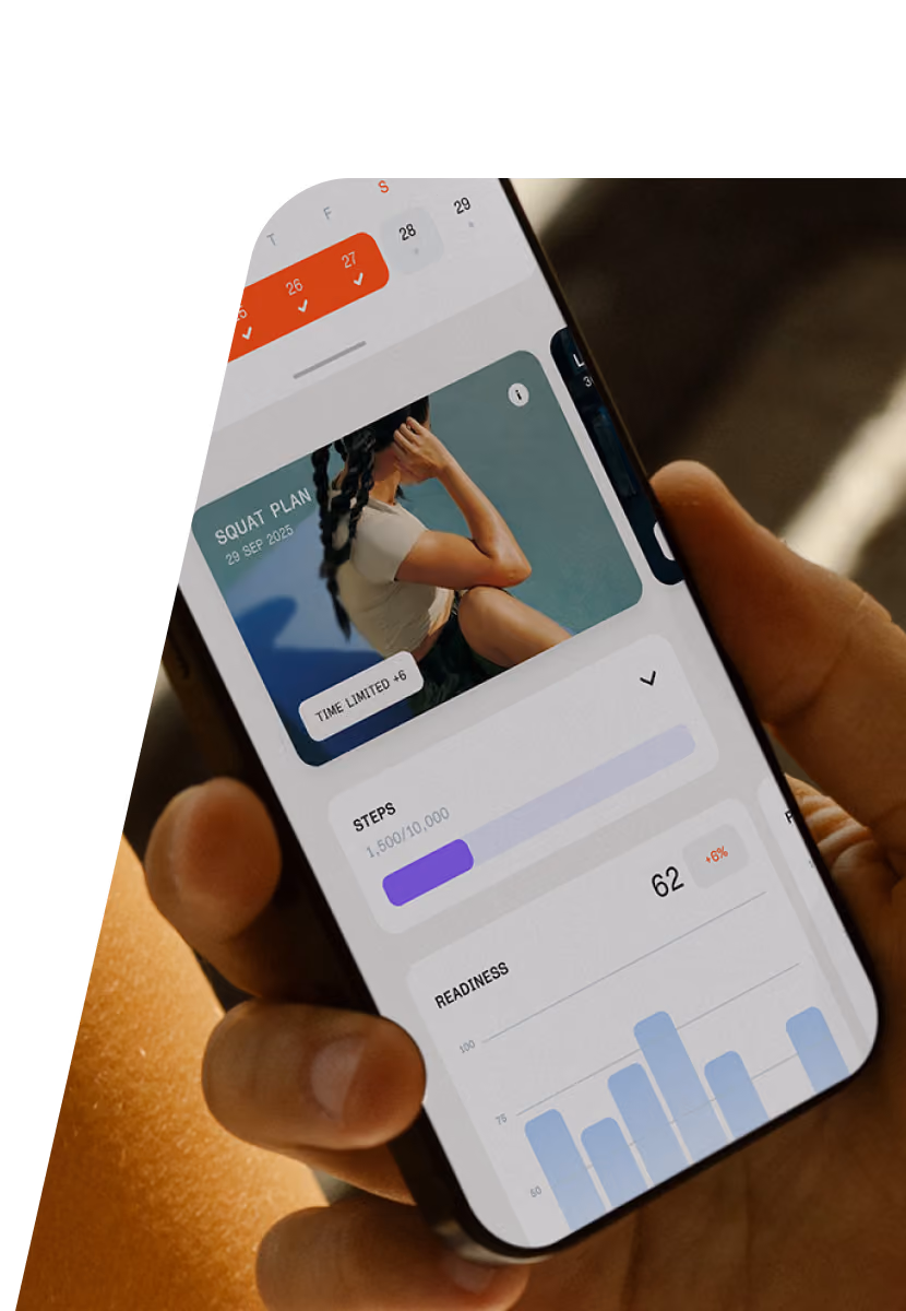 Hand holding a smartphone displaying a fitness app with a squat plan dated 29 Sep 2025, progress bar showing 1,590 steps of 10,000 goal, and readiness score of 62 with a downward 6% change.