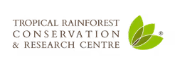 Logo with text 'Tropical Rainforest Conservation & Research Centre' accompanied by a graphic of three green overlapping leaves on the right.