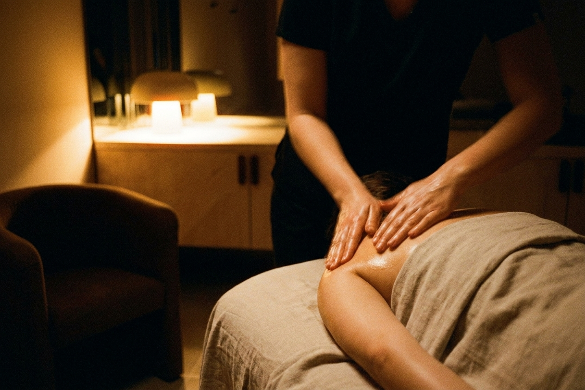 A therapist's hands during a massage treatment