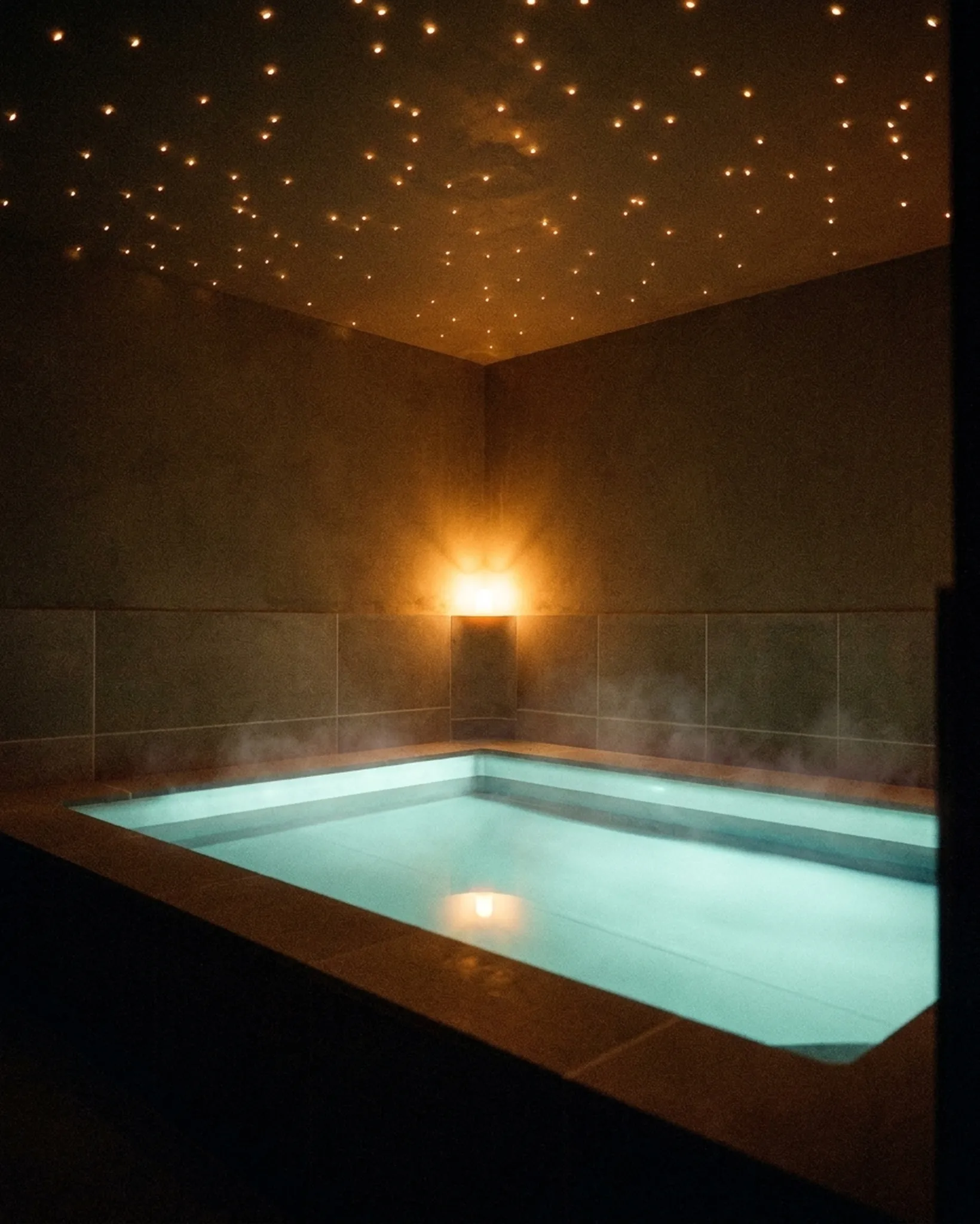 A VELA float pool beneath a starlit ceiling