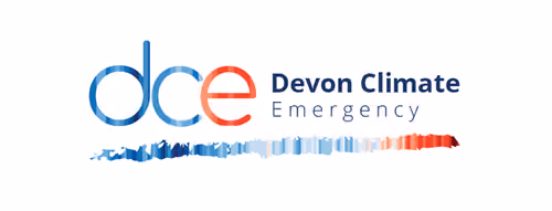 Devon Climate Emergency logo with stylized lowercase letters dce in blue and red, with a blue to red gradient brush stroke underneath.