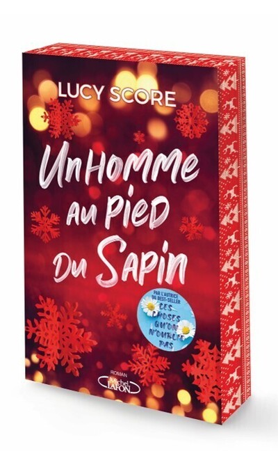 Un homme au pied du sapin
