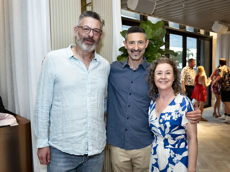 Three StrataMax team members at the Christmas party