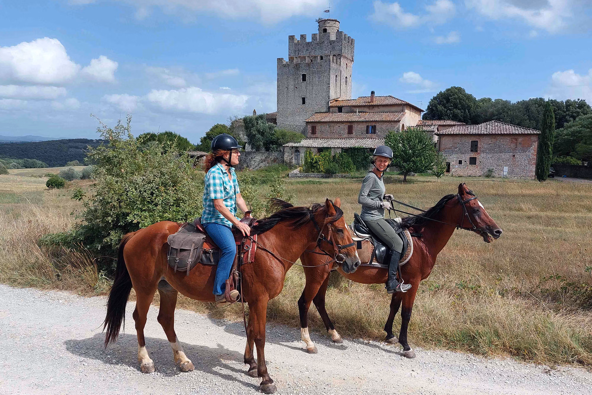 Two riders in Tuscany on a horse riding holiday
