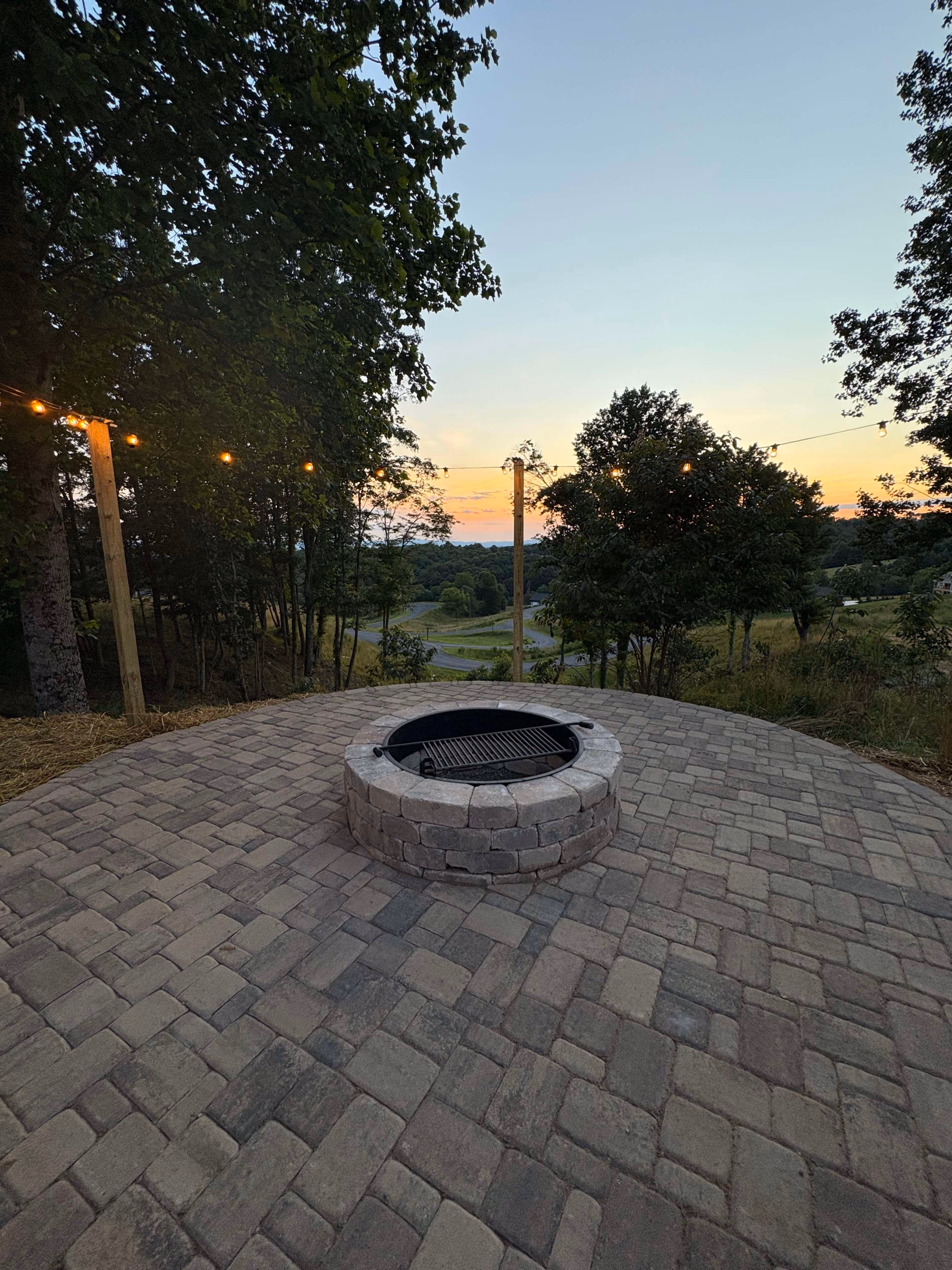 fire pit and paver installation by Rowland Outdoor Design