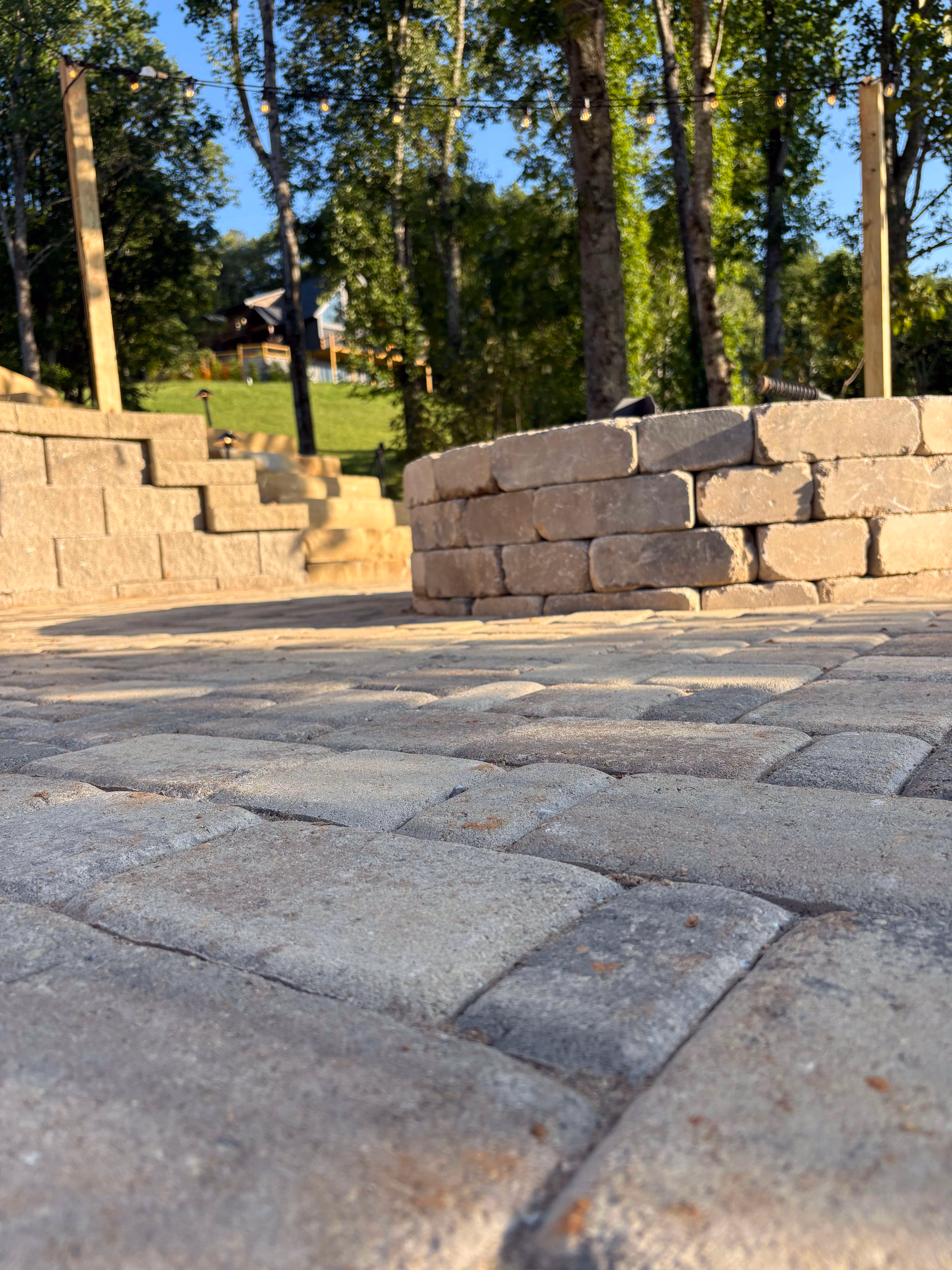 Custom Paver walkway and patio design by Rowland Outdoor Design