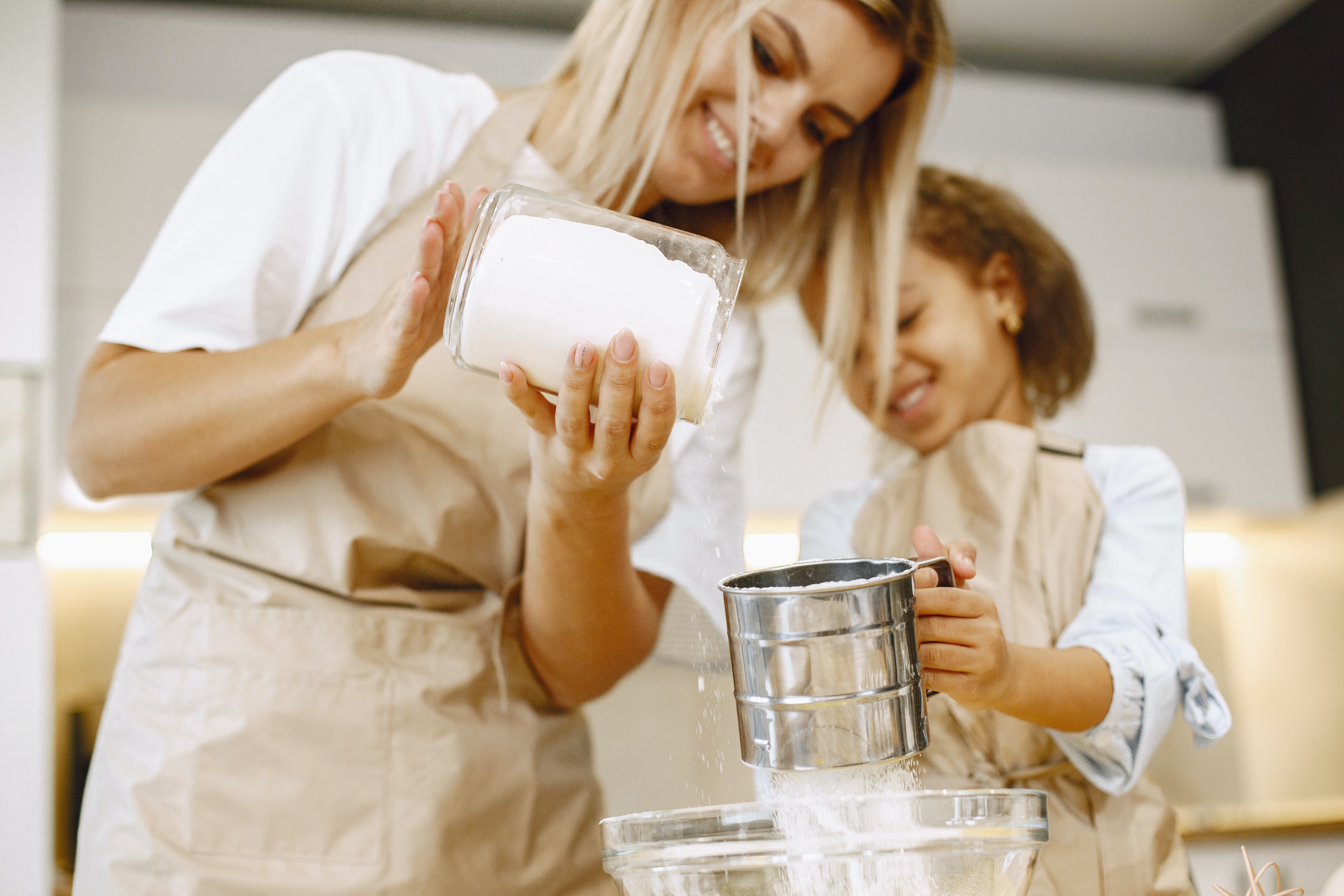 Woman and child baking stock image