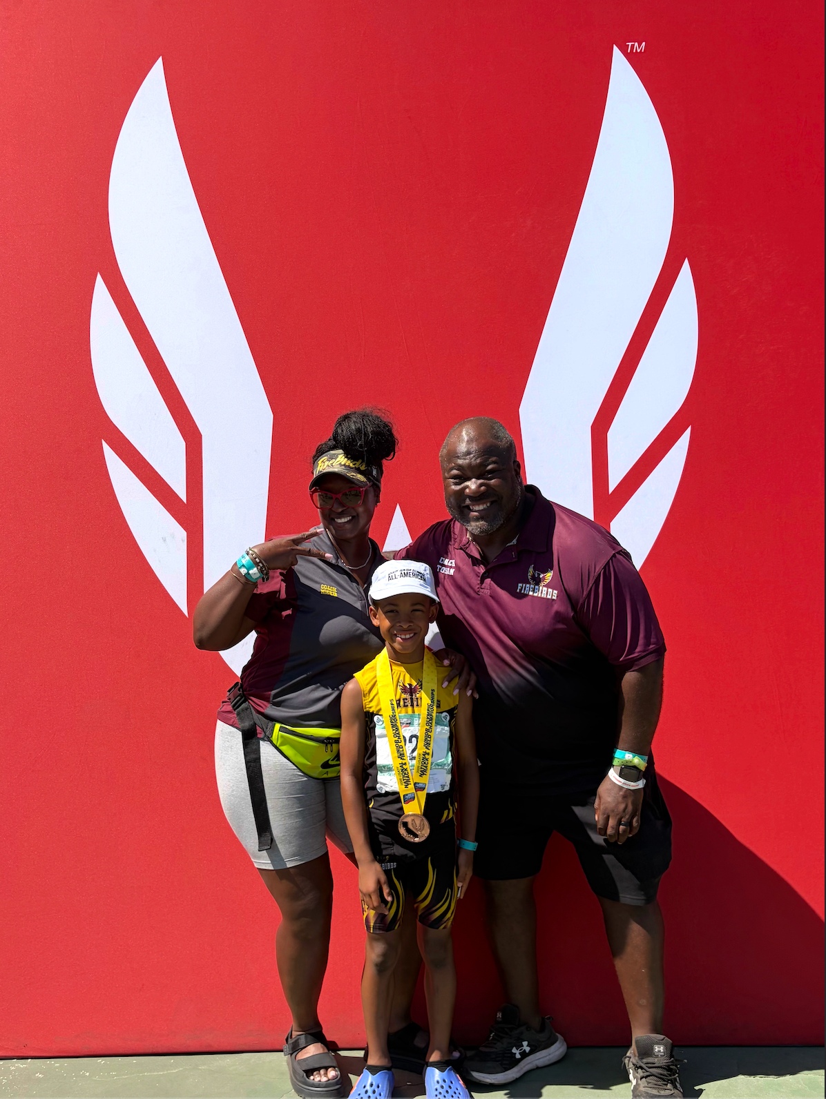 Firebirds athlete and family celebrating