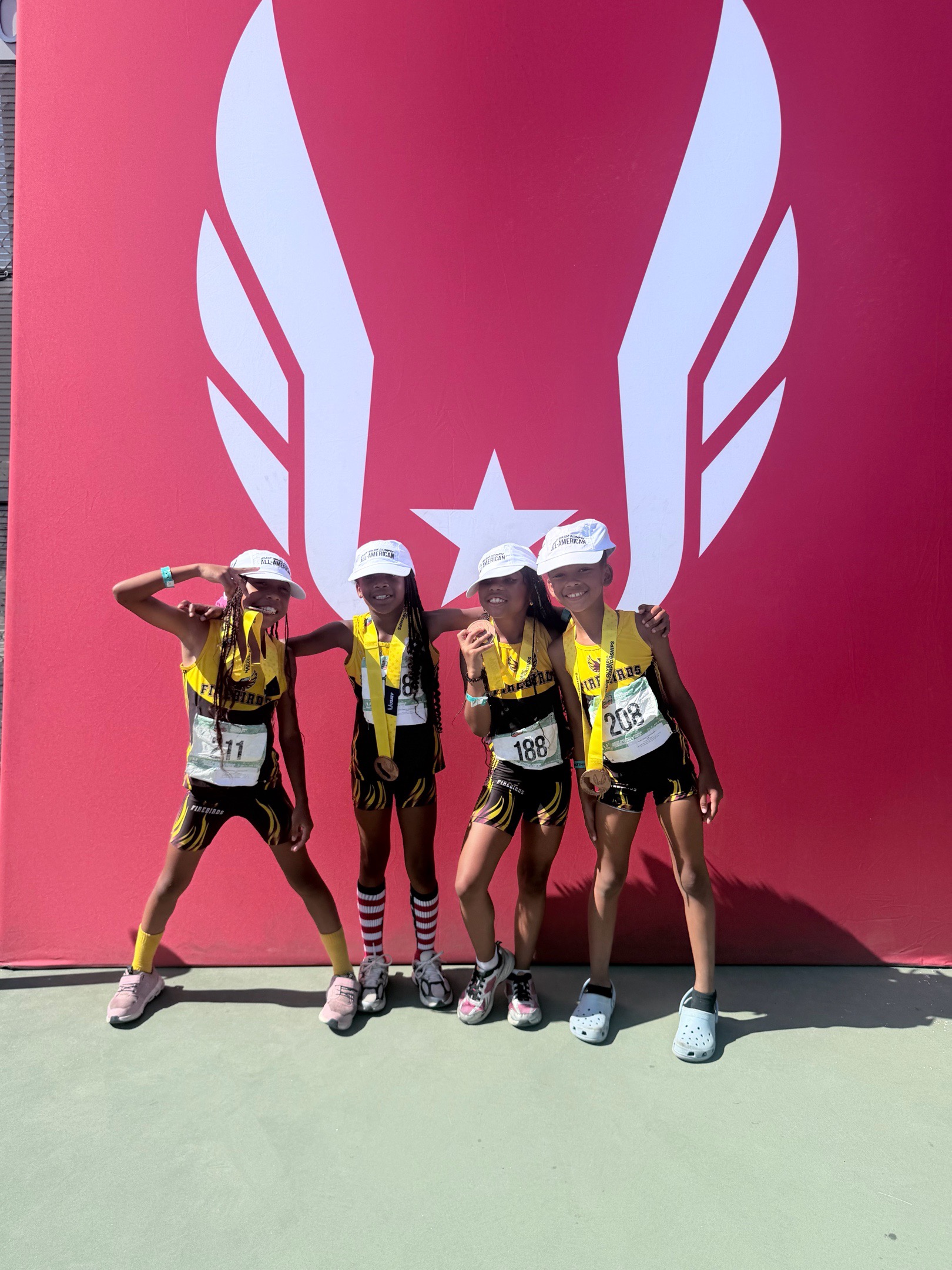 Firebirds 8U girls 4x400 meter All-American relay team