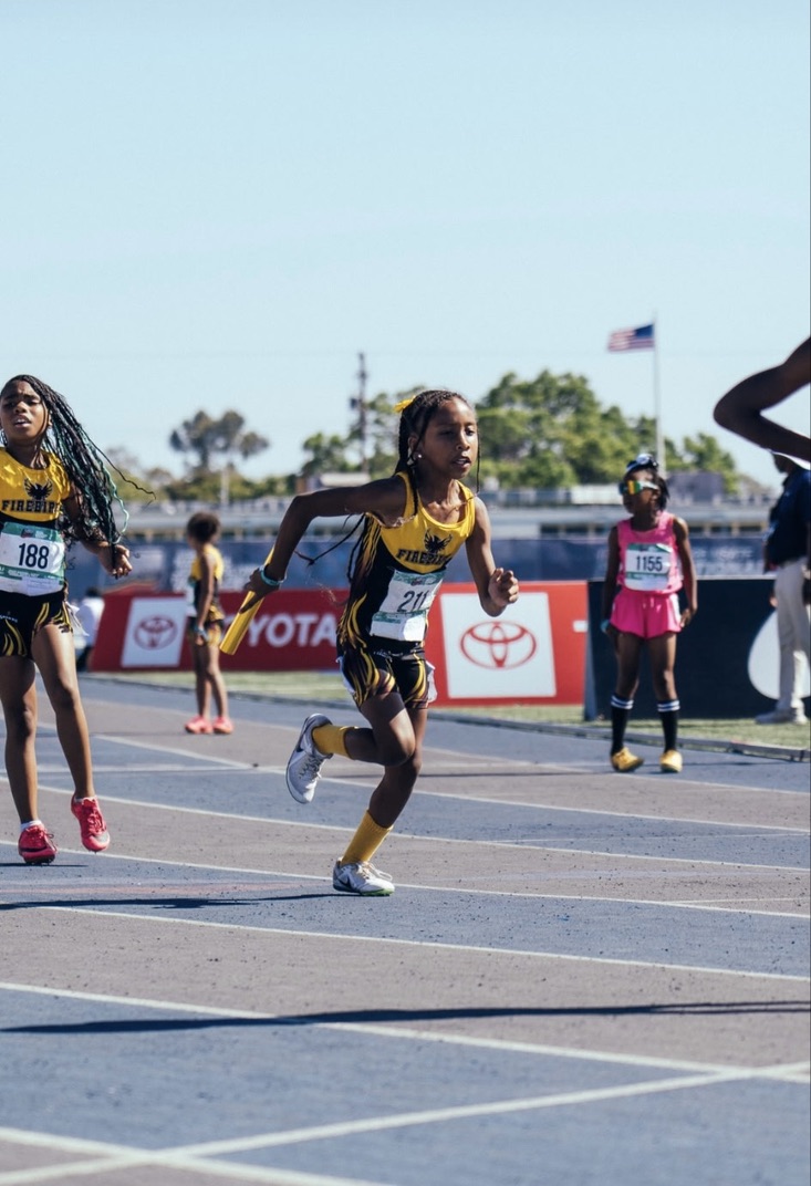 Firebirds coaches and athletes at the 2026 USATF Junior Olympics