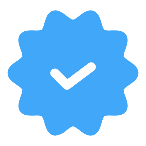 Blue verification badge shaped like a starburst with a white checkmark in the center.