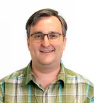 Headshot of David Kuznik, Product Manager at Telogical Systems.