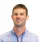 Headshot of John Grotheer, Client Services Manager at Telogical Systems.