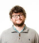 Headshot of Tom Grinnell, Team Lead for Operations at Telogical Systems.