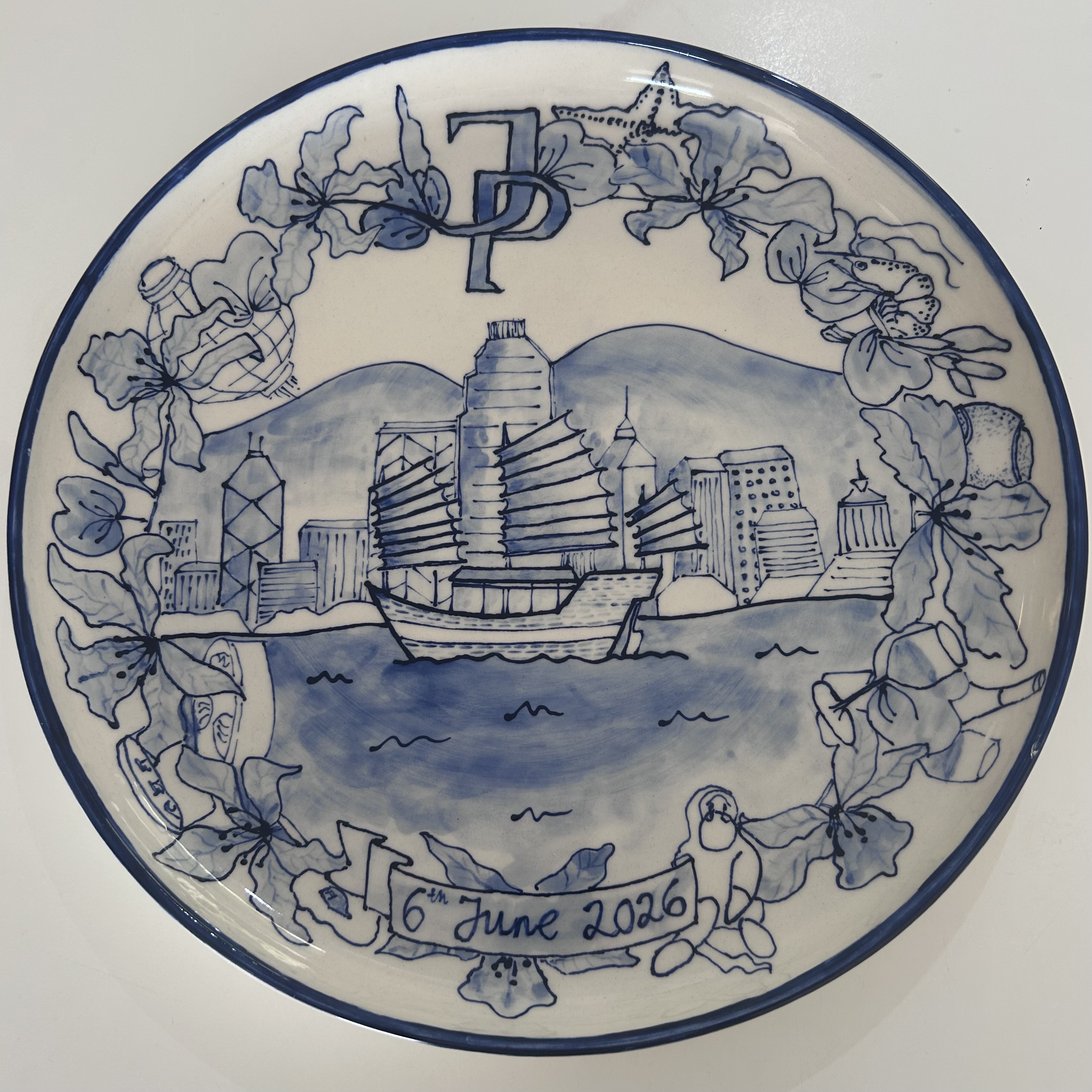Hand-painted blue and white plate for Poppy and Jack