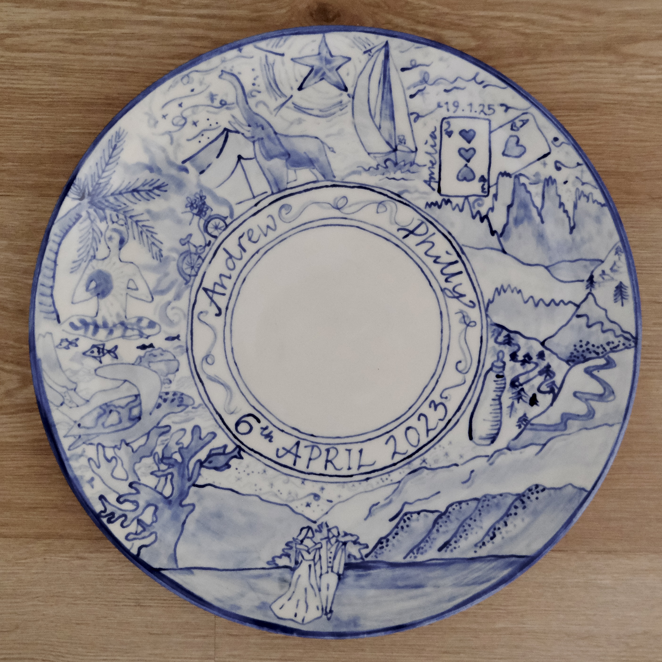 Hand-painted blue and white plate for Andrew and Philly