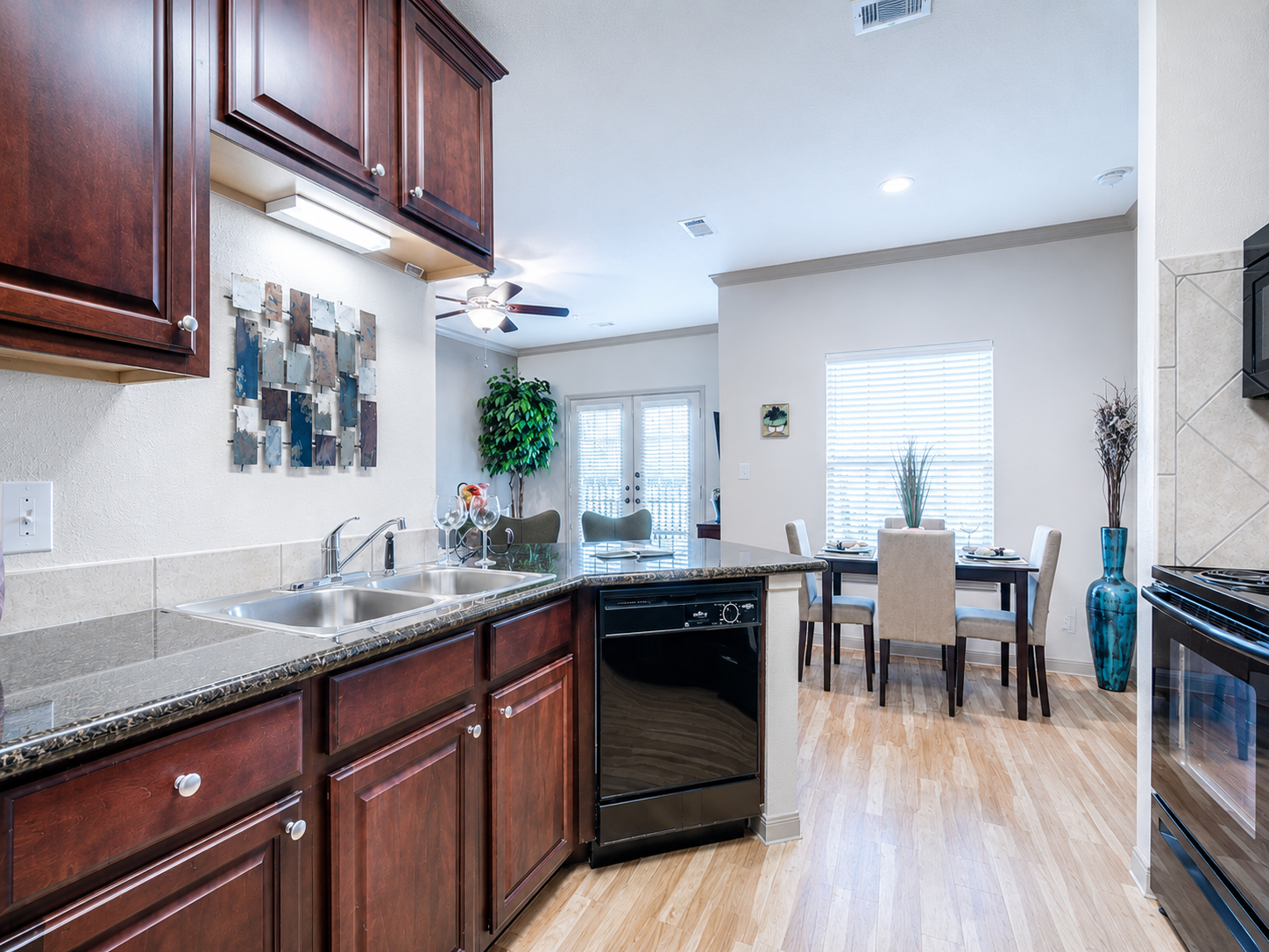 Kitchen with brown cabinets