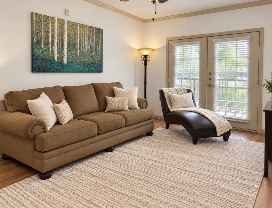 Living room area at Lookout Hollow Apartments in Selma, Texas