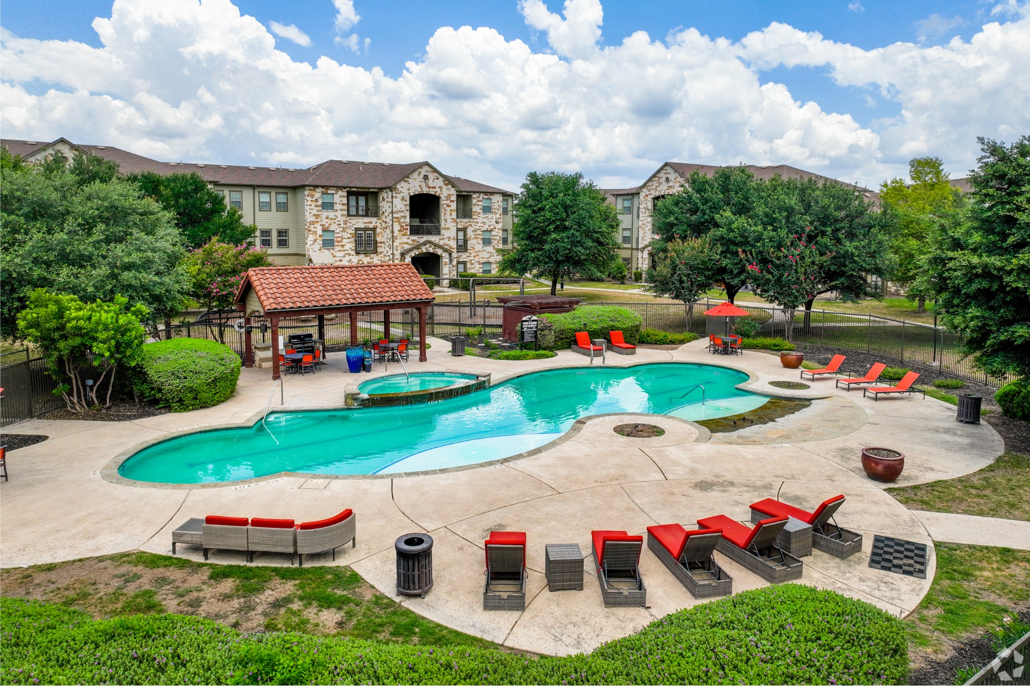 Spacious Pool Area at Lookout Hollow Apartments in Selma, Texas