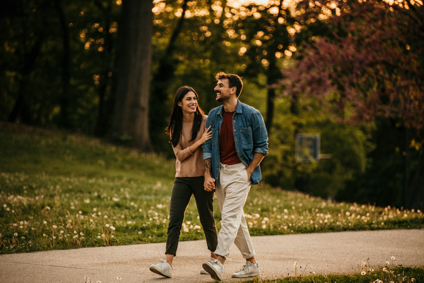 Couple walking outdoors stock image