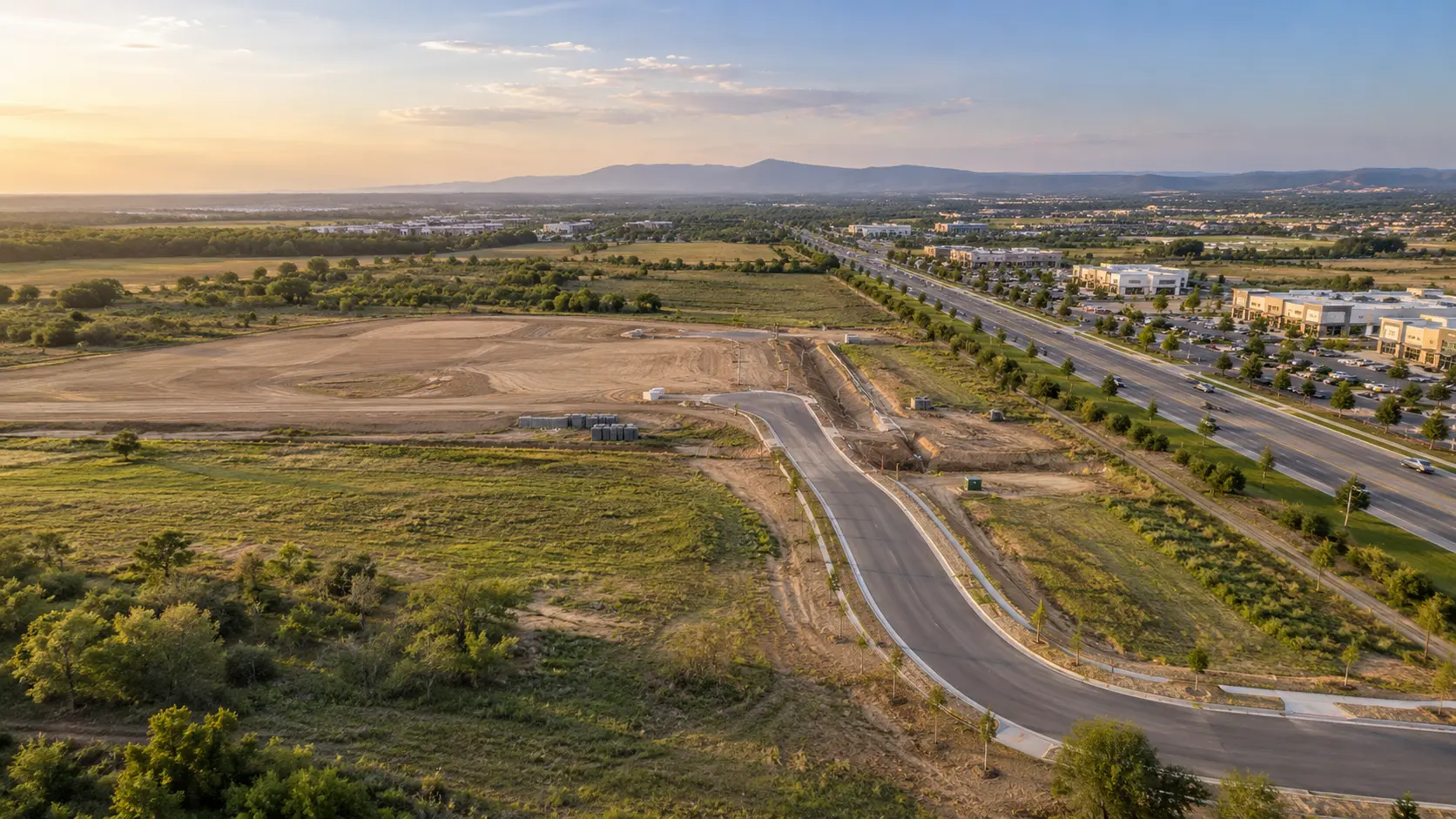 Development land with new infrastructure beside a growing commercial corridor