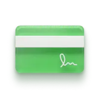Green credit card with a white signature strip and a stylized signature at the bottom right.