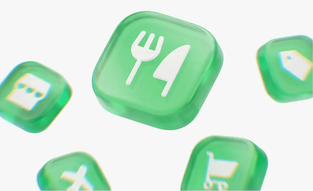 Green square button with white fork and knife icon representing food or dining.