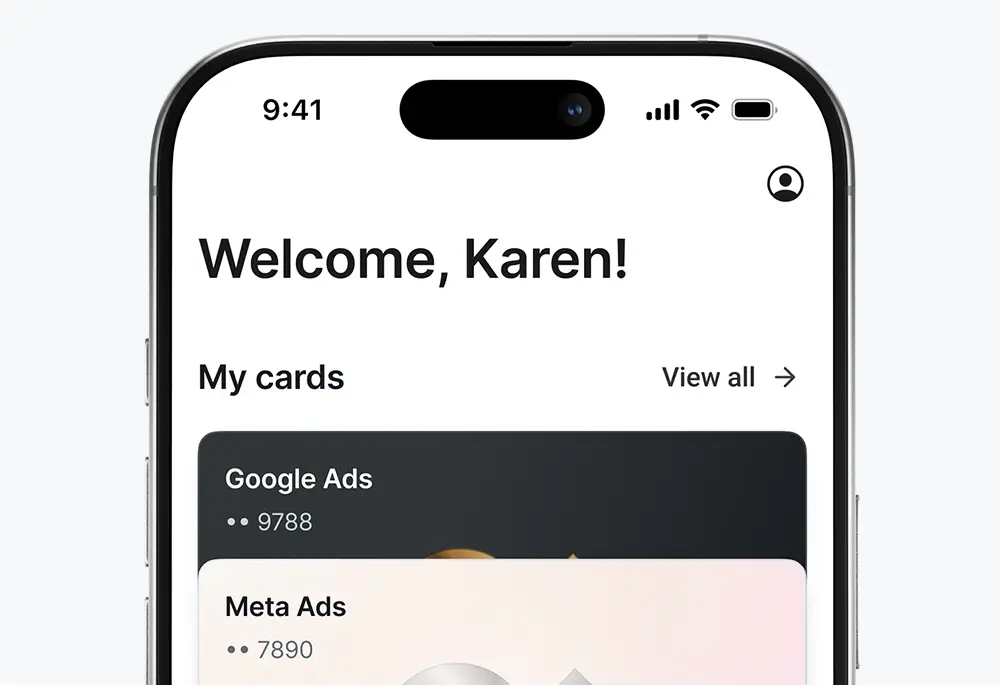 Smartphone screen showing welcome message to Karen and cards for Google Ads and Meta Ads accounts.