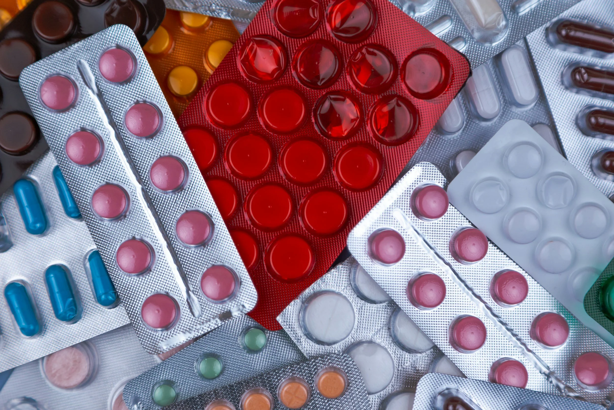 Assorted prescription pills in blister packs