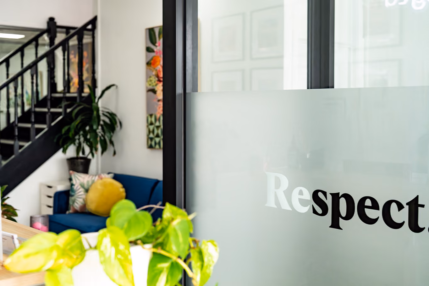 The Respect Wills & Estates Office entrance with the word respect on the glass wall.