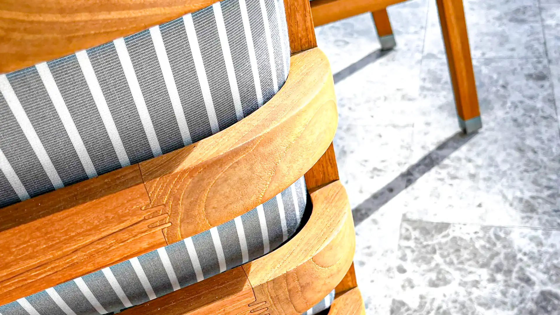 Controlled cleaning and sanding of outdoor hardwood furniture