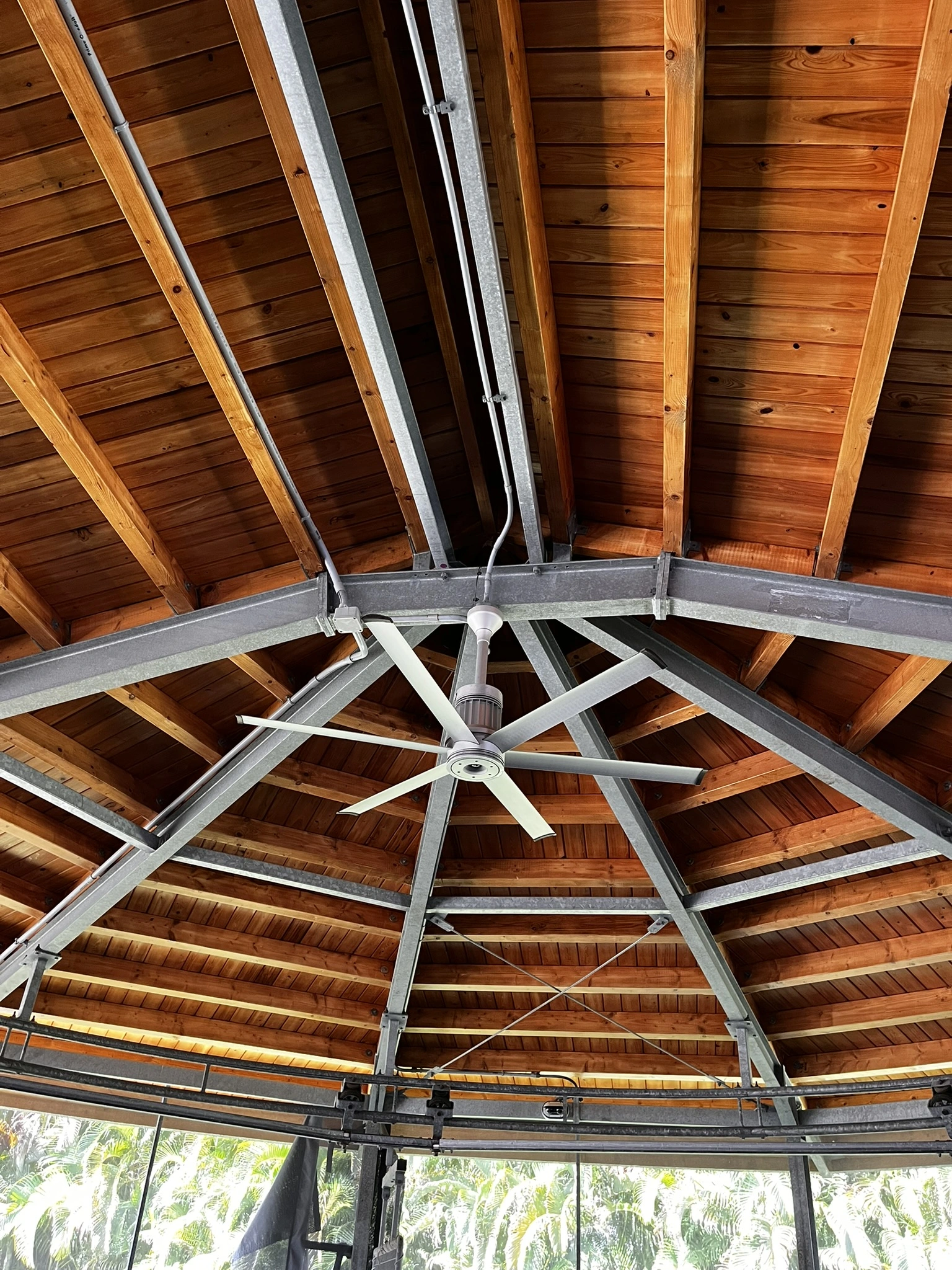 Restored architectural wood ceiling after refinishing