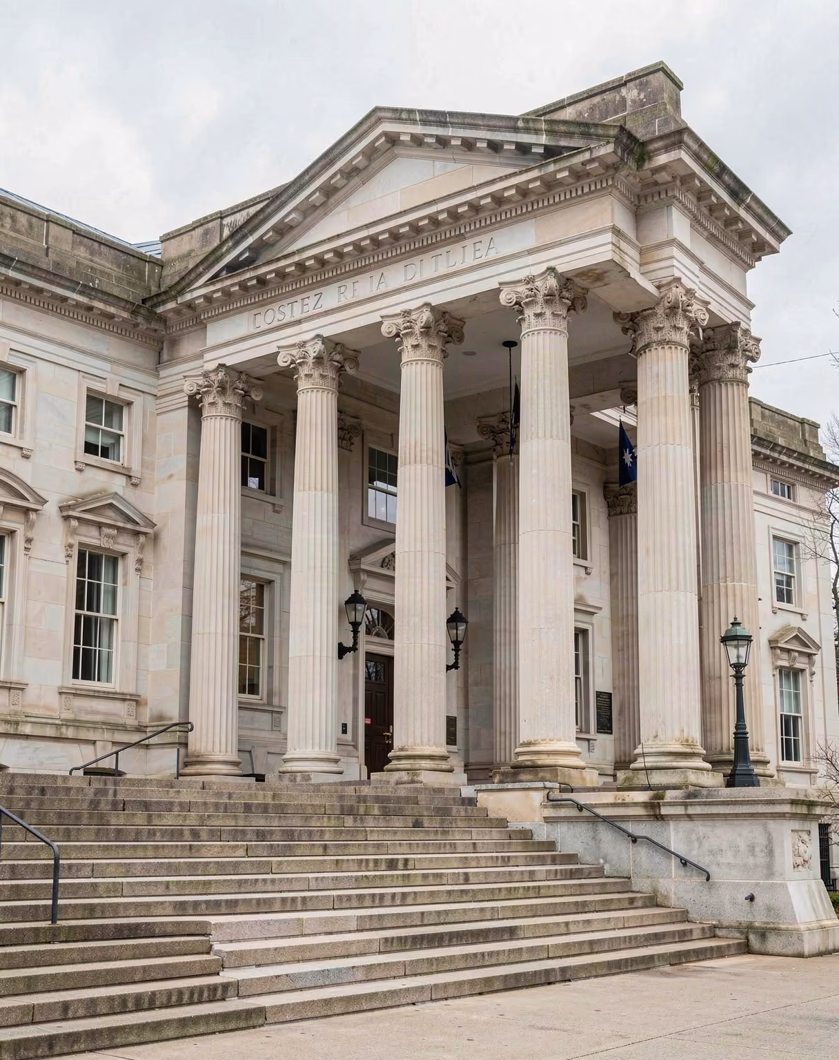A neoclassical federal government building with stone columns