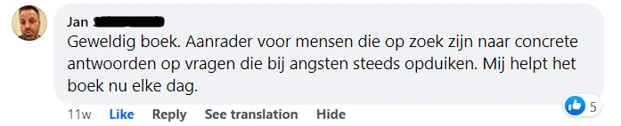 A man is writing a message in a foreign language.