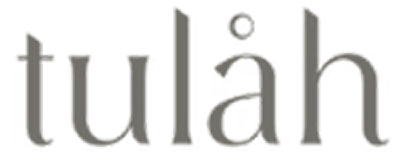 The word 'tulah' written in lowercase serif font with a small dot above the letter 'a'.
