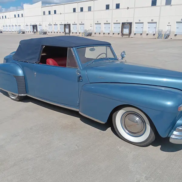 Blue 1940s Lincoln Continental convertible with whitewall tires appraised in Texas