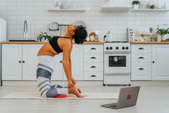 woman practicing yoga in day-to-day life