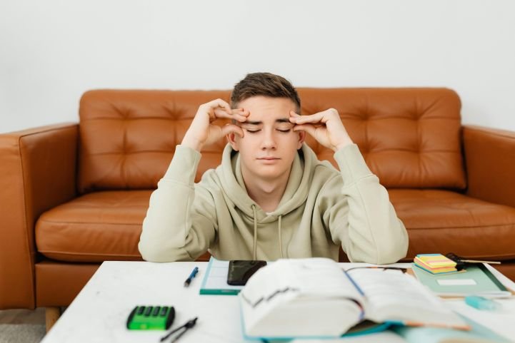 A young person trying to improve concentration.